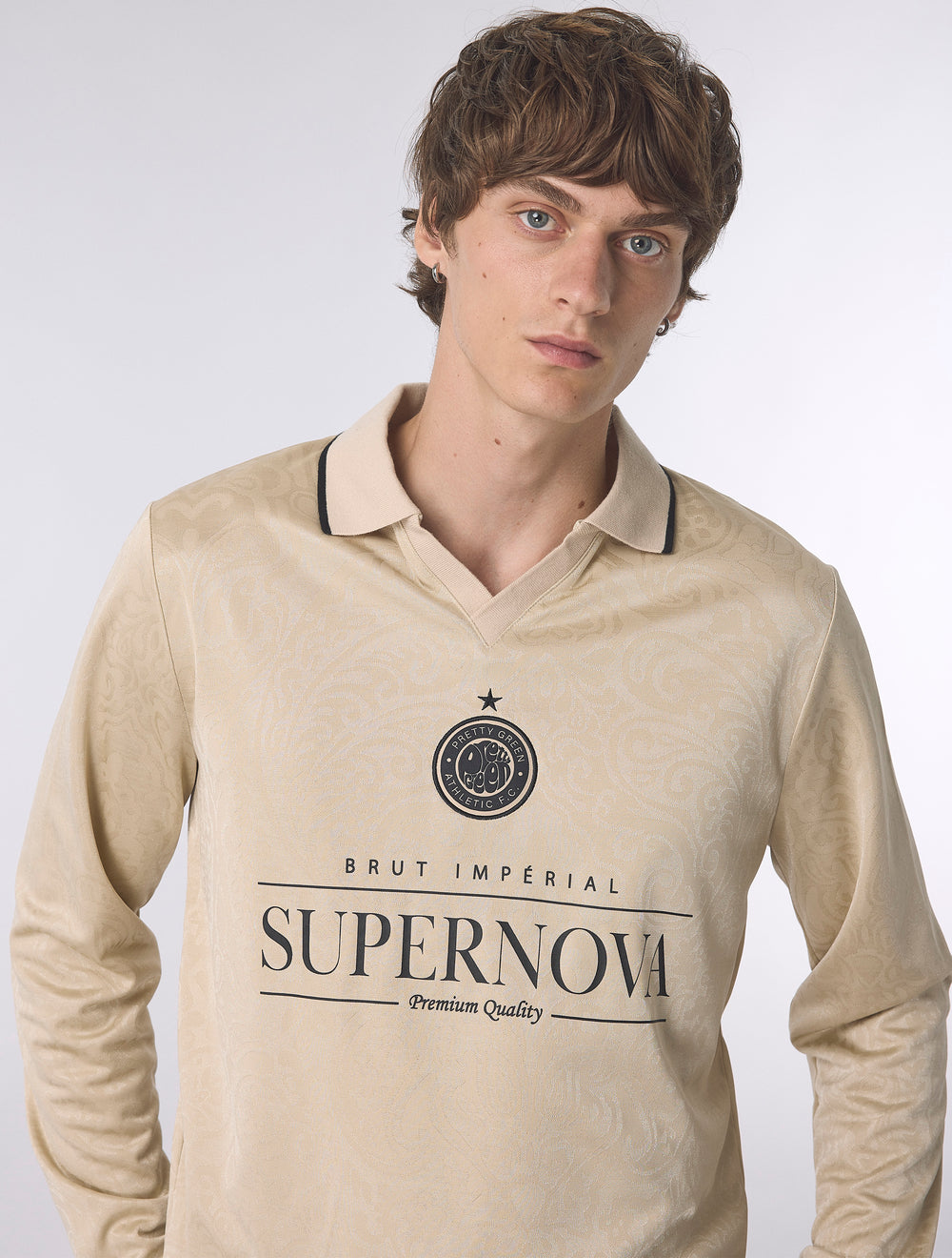 Champagne Supernova Football Top